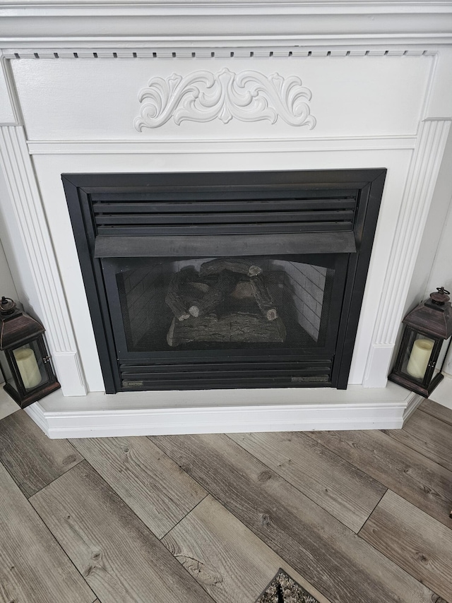 interior details featuring wood-type flooring