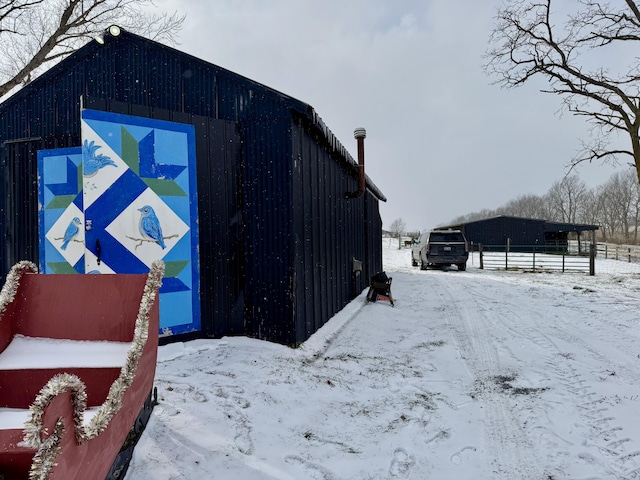 view of snow covered property