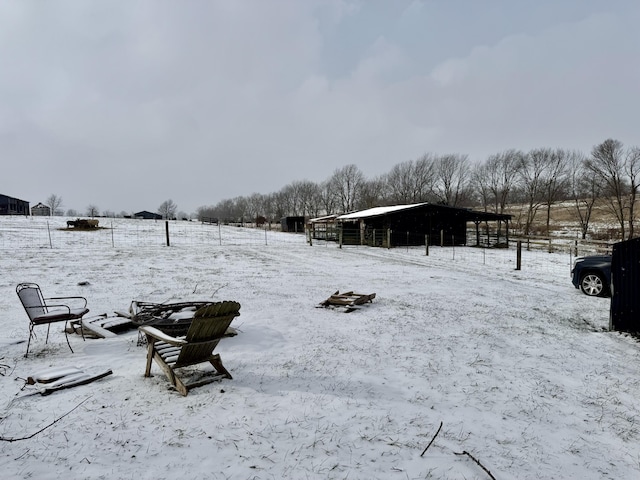 view of yard layered in snow