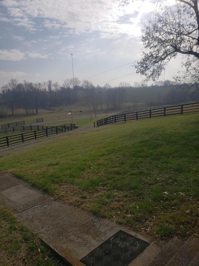 view of yard featuring a rural view