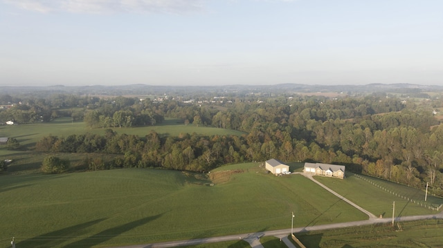 birds eye view of property featuring a rural view