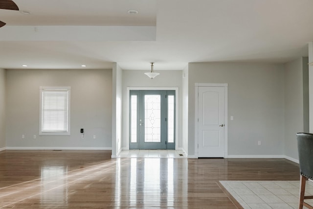 entrance foyer featuring light tile patterned floors