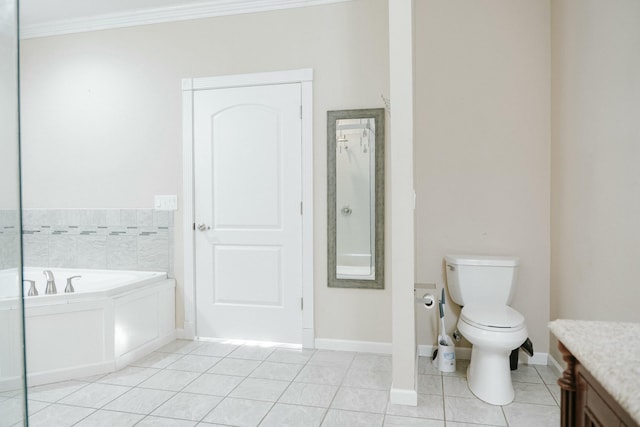 bathroom with toilet, crown molding, tile patterned floors, vanity, and a bathing tub