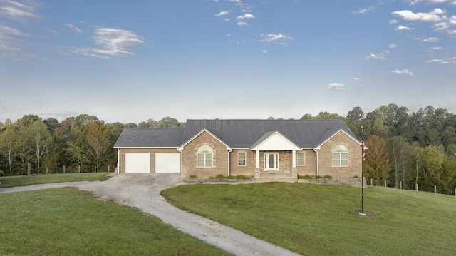 ranch-style house with a front yard and a garage