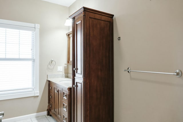 bathroom with vanity and tile patterned floors