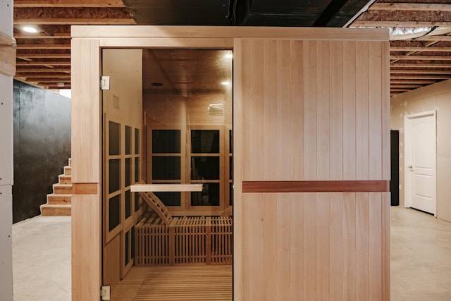 view of sauna with concrete floors