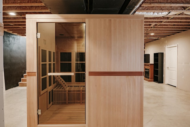 view of sauna with concrete floors