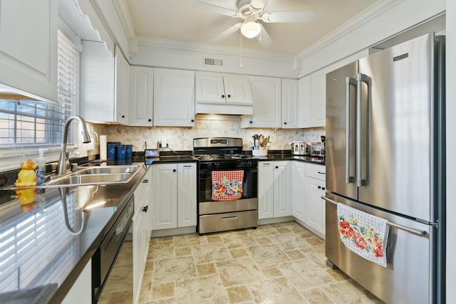 kitchen with decorative backsplash, sink, white cabinetry, and stainless steel appliances