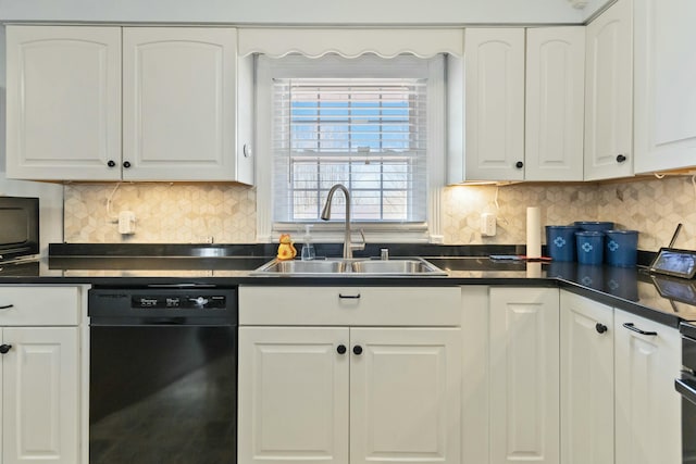 kitchen with tasteful backsplash, sink, black dishwasher, and white cabinetry