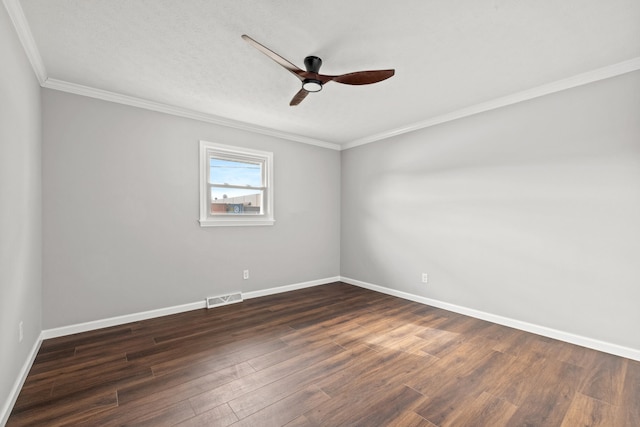 unfurnished room with a textured ceiling, ornamental molding, dark hardwood / wood-style floors, and ceiling fan