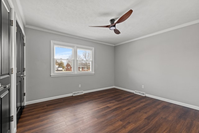 unfurnished bedroom with ceiling fan, crown molding, dark hardwood / wood-style floors, and a textured ceiling