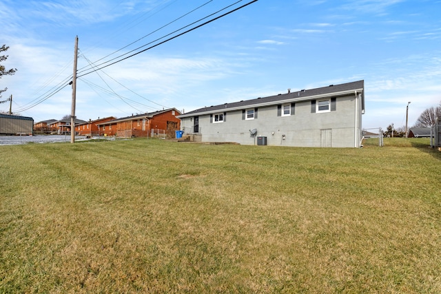 view of yard with central AC unit