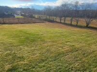 view of yard with a rural view