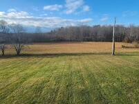 view of yard with a rural view