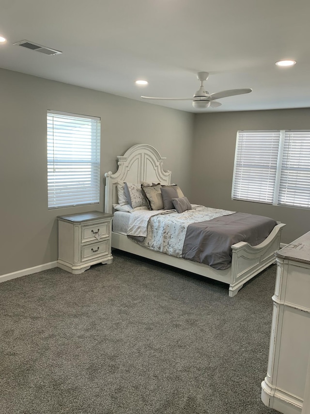 carpeted bedroom with ceiling fan