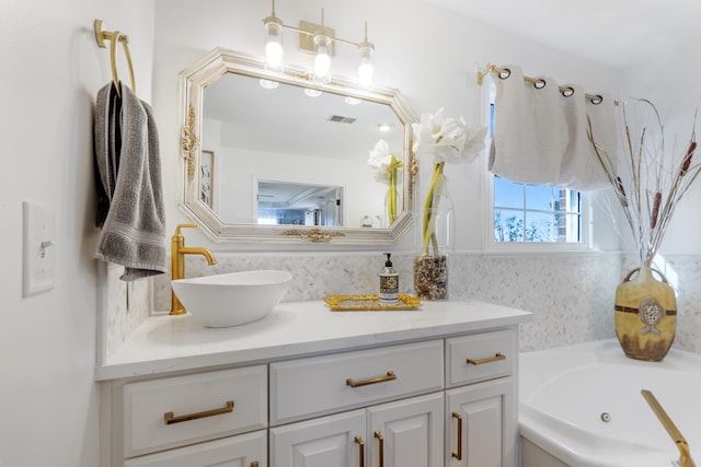 bathroom featuring vanity and a bathing tub