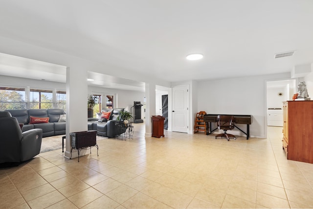 living room with light tile patterned floors