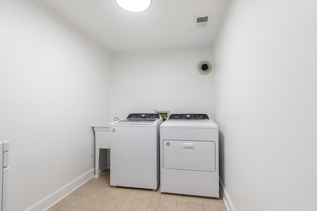 laundry room featuring washer and dryer