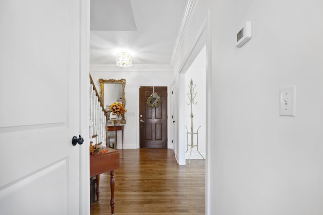 hallway featuring dark hardwood / wood-style flooring and crown molding