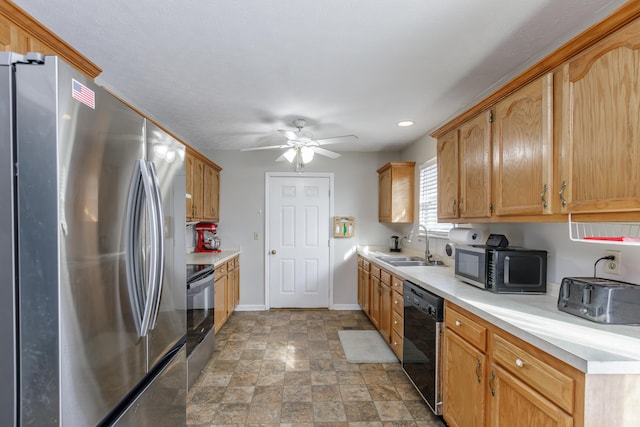 kitchen featuring ceiling fan, appliances with stainless steel finishes, and sink