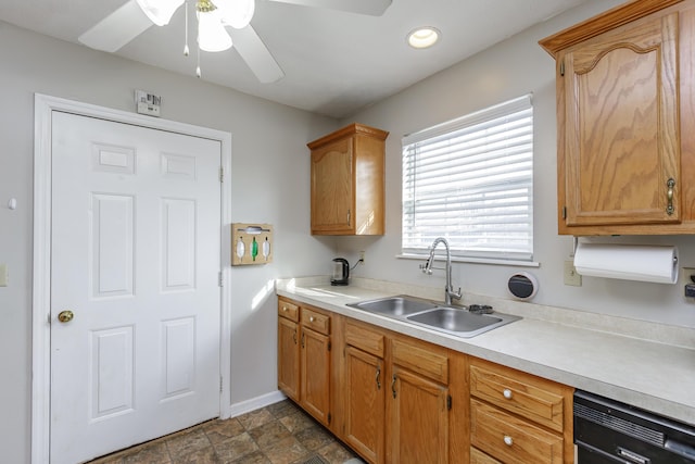 kitchen featuring sink, black dishwasher, and ceiling fan