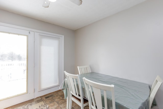 dining area featuring ceiling fan