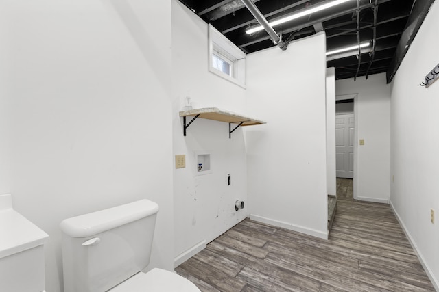 laundry area with hookup for a washing machine and hardwood / wood-style floors