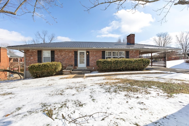 view of front of house featuring a carport