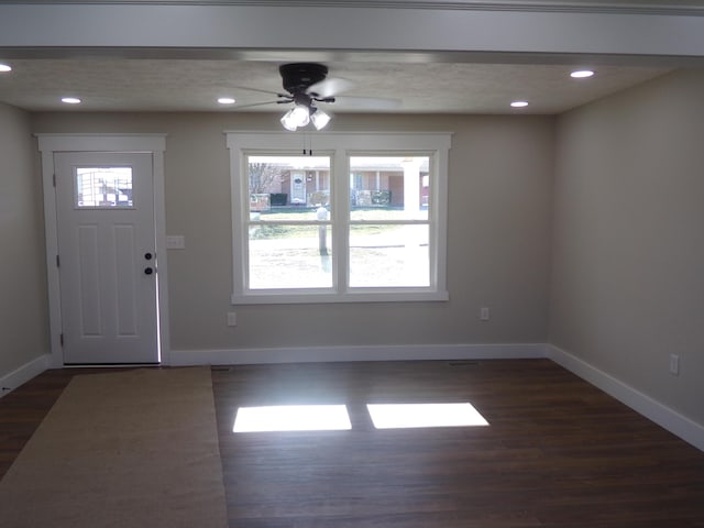 foyer entrance with dark wood-style floors, baseboards, a ceiling fan, and recessed lighting