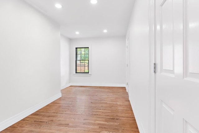 spare room featuring light hardwood / wood-style floors