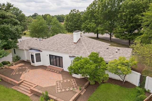 rear view of property with a patio area