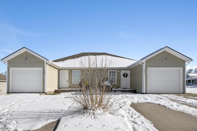 ranch-style house featuring a garage