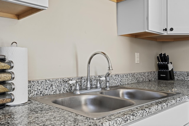 room details with sink and white cabinets