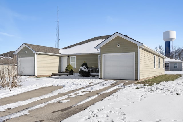 ranch-style home with a garage