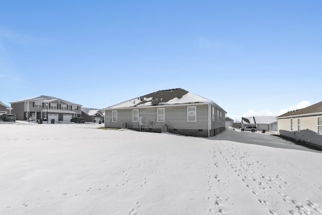 view of snow covered property