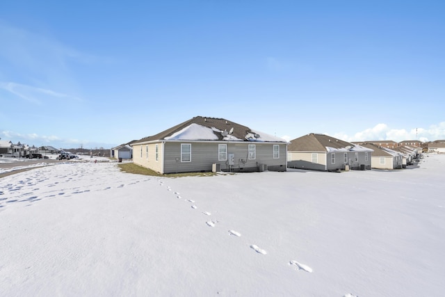 view of snow covered house