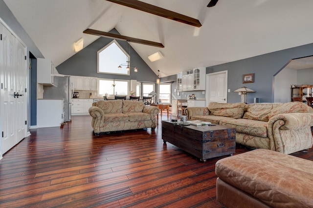 living room featuring beamed ceiling, dark hardwood / wood-style floors, and high vaulted ceiling