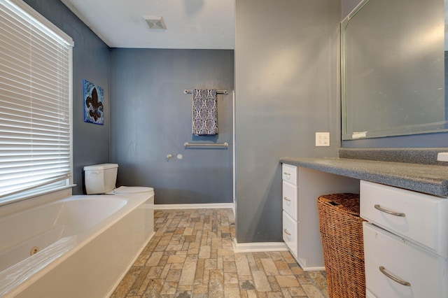 bathroom featuring vanity and a bathtub