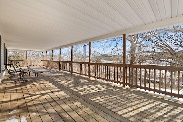 view of snow covered deck