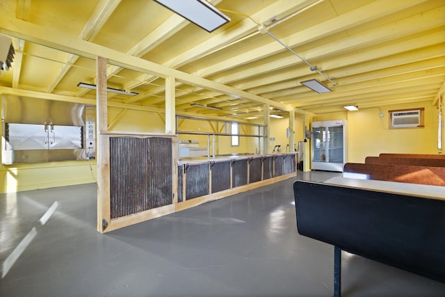 view of horse barn with a wall unit AC