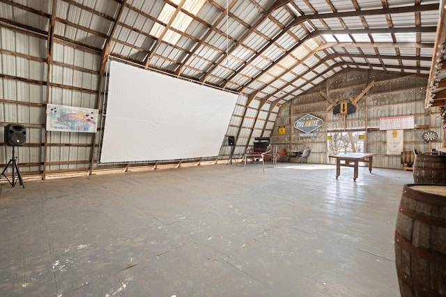 miscellaneous room with lofted ceiling