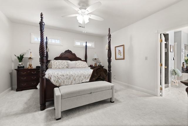 bedroom featuring light carpet and ceiling fan