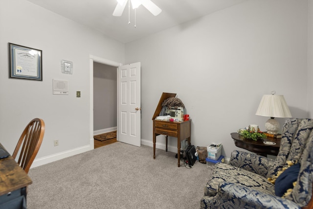 office with ceiling fan and carpet floors