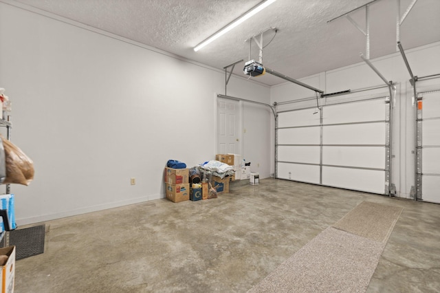 garage featuring a garage door opener