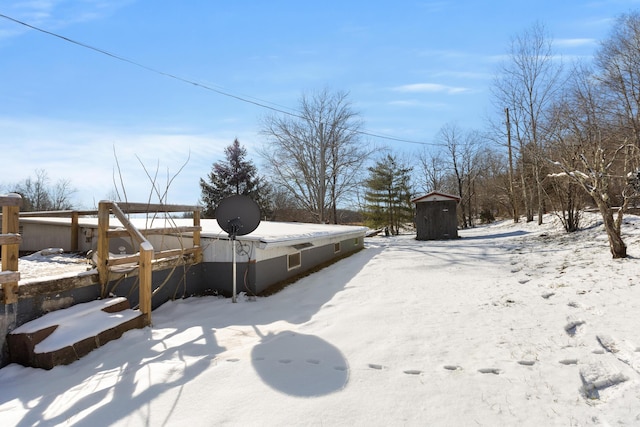 view of yard covered in snow