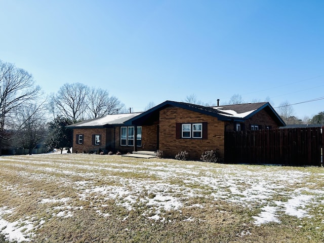 view of snow covered property