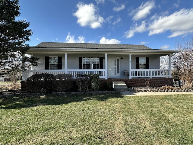 ranch-style house featuring a front yard and a porch