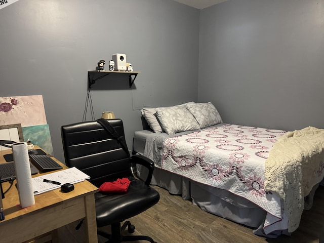 bedroom featuring hardwood / wood-style flooring