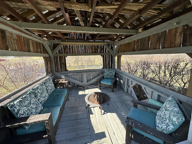 deck featuring an outdoor fire pit