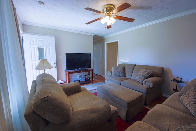 living room featuring ceiling fan, crown molding, a textured ceiling, and hardwood / wood-style floors